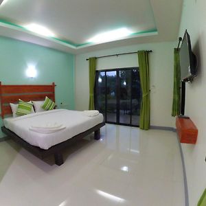 Kamer met een Queen Size Bed